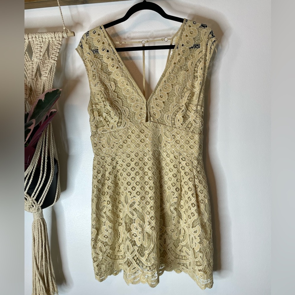 Free People One Million Lovers mini dress in ivory. Size 10. New with tag!
